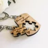 Kép 4/4 - Szerelmespár fa kulcstartó dögcédula + puzzle