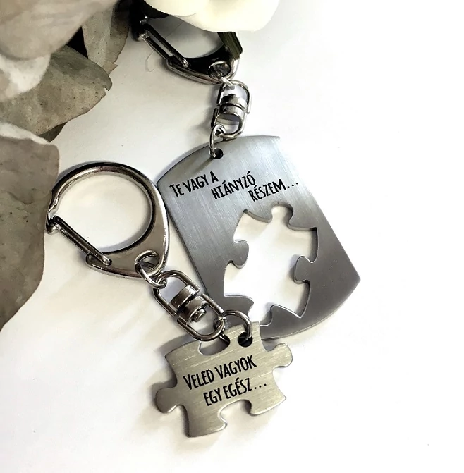 Dögcédula/puzzle páros nemesacél kulcstartó